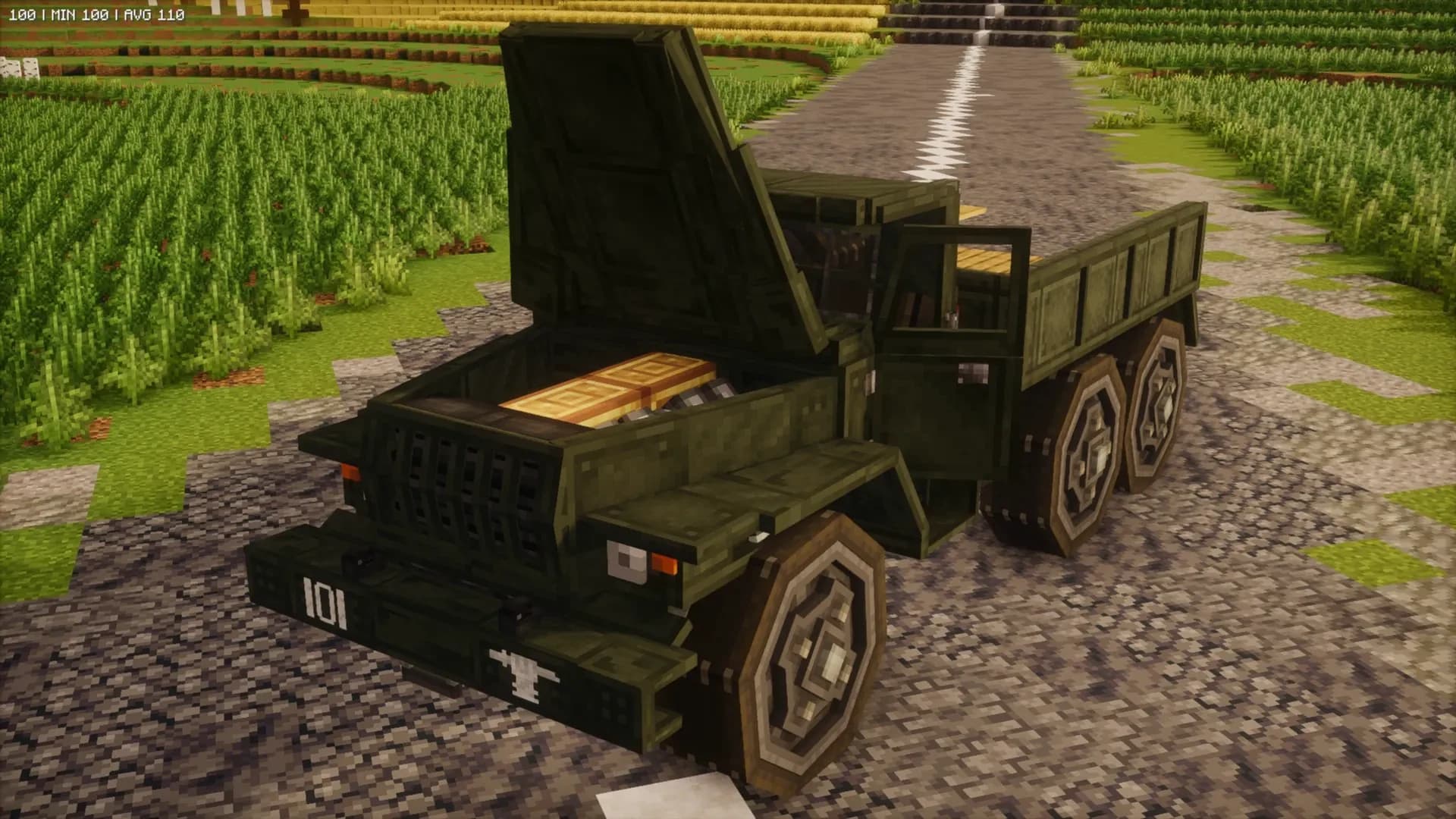 An engineering truck with an open engine compartment beside Astra's fields