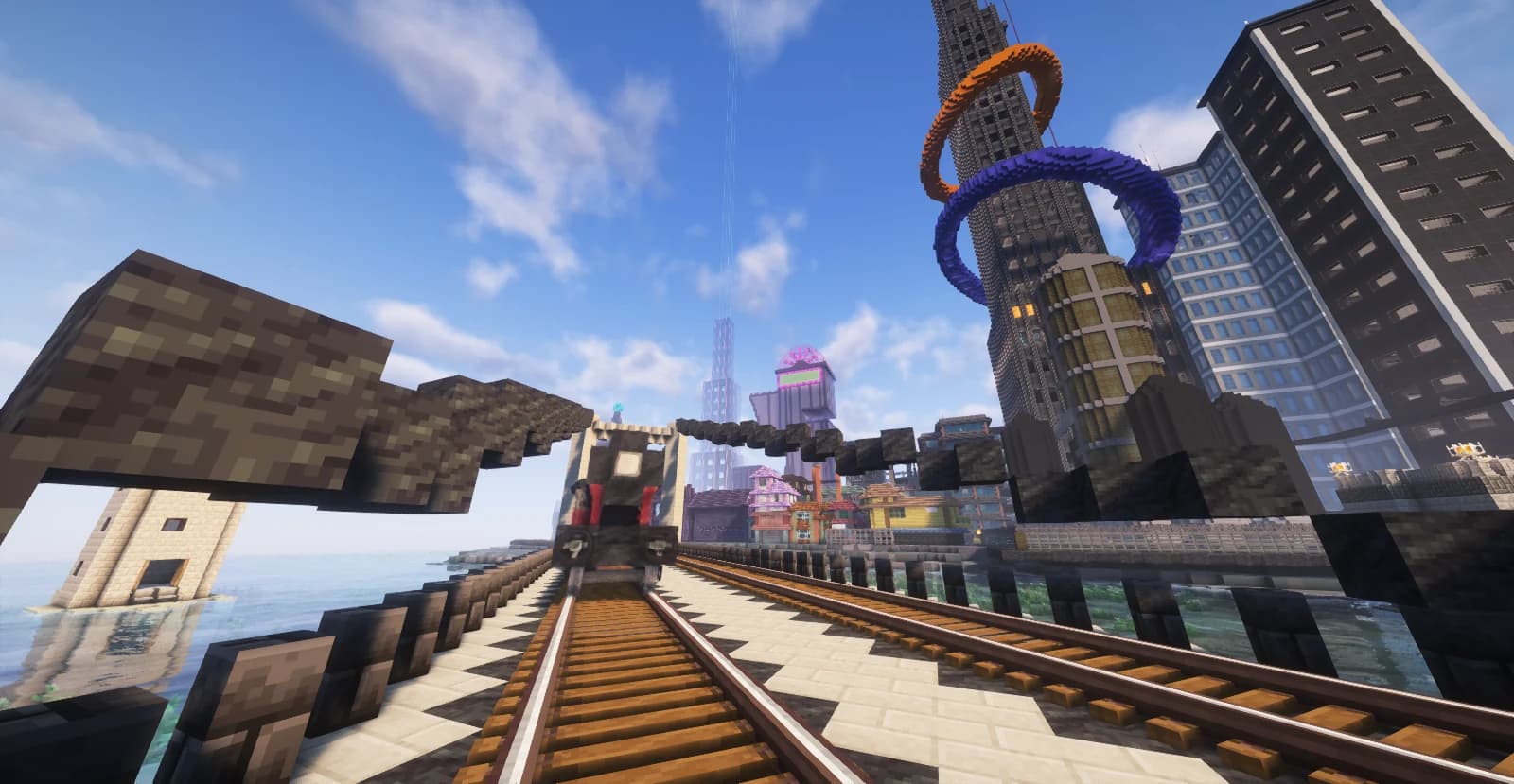 A Create train at a station between city buildings