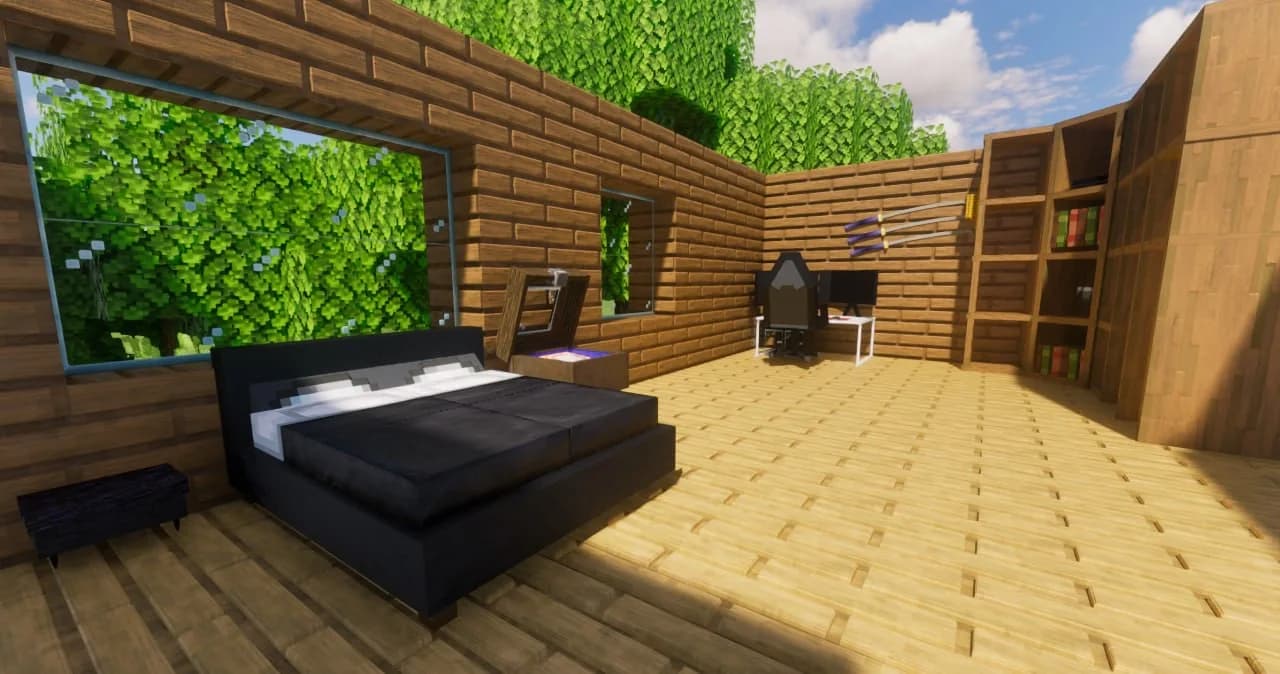 A Minecraft bedroom with a large bed, a desk and bookshelves