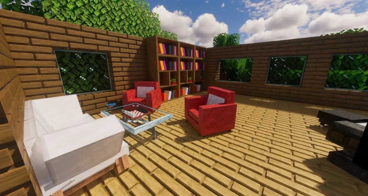 A Minecraft living room with a sofa, red armchairs, a bookcase and a chess table